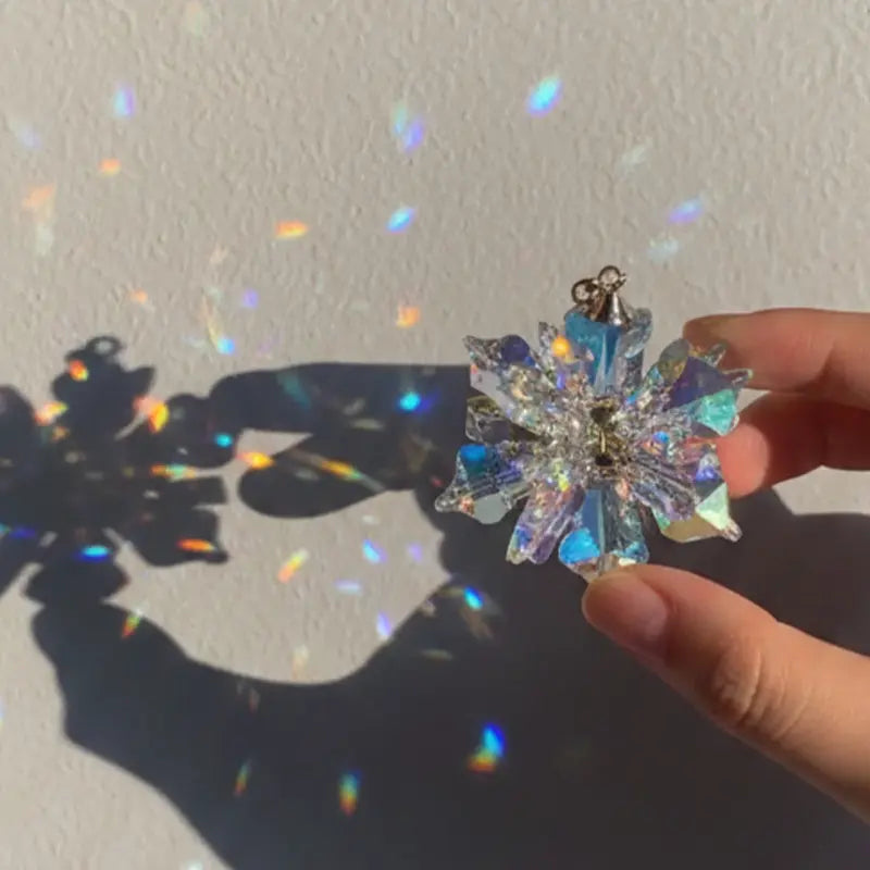 Crystal Aurora Suncatcher in sunlight with rainbow prism reflections photo 1
