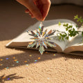 Crystal Snowflake Suncatcher in sunlight with rainbow prism reflections photo 1