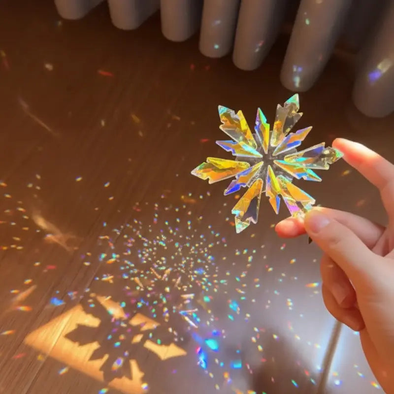 Crystal Snowflake Suncatcher in sunlight with rainbow prism reflections photo 2